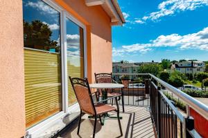 Balkón nebo terasa v ubytování Appartementhaus mit Balkon im Ostseebad Göhren VM