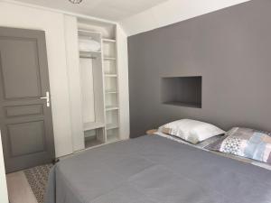 Postel nebo postele na pokoji v ubytování Résidence du Parc