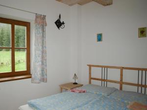 Postel nebo postele na pokoji v ubytování Chata Pod Koberštejnem