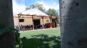 a view of a house with a patio at Maison 25 in 2 Mai