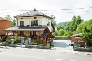 a house on the side of a street at Agro-Relax in Bałtów