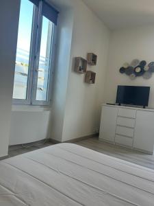 Postel nebo postele na pokoji v ubytování Studio élégant, central, pour 2 personnes