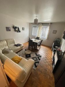 Et opholdsområde på Appartement proche du centre - 58 m2