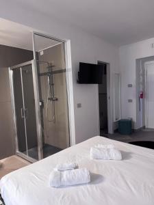 Postel nebo postele na pokoji v ubytování MA PI B&B Room Boutique
