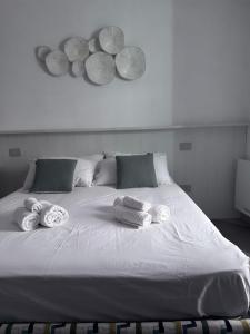 Postel nebo postele na pokoji v ubytování MA PI B&B Room Boutique
