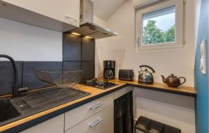 Kuchyň nebo kuchyňský kout v ubytování Charmant Appartement