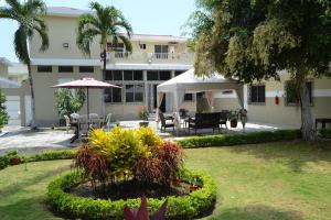 Zahrada ubytování Urdesa Suites Hotel