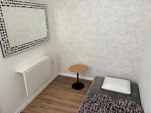 Letto o letti in una camera di Luxusní apartmán v centru Jihlavy