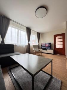 Χώρος καθιστικού στο The Golden Waves - Family apartments in Klaipėda