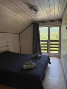 Postel nebo postele na pokoji v ubytování Джерело