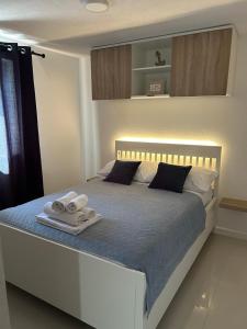 Ένα ή περισσότερα κρεβάτια σε δωμάτιο στο Apartman Family