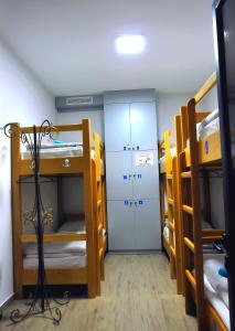 Postelja oz. postelje v sobi nastanitve MGA Hostel & Tours