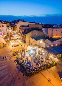 an outdoor event in a city at night at Seabreeze Ultracentral - NeverSea Beach in Constanţa
