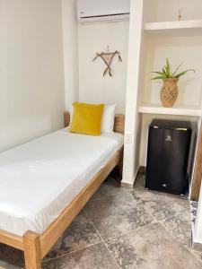 Postel nebo postele na pokoji v ubytování Hotel Heliopolis