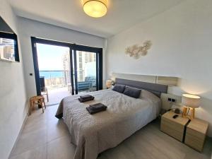 Postel nebo postele na pokoji v ubytování Sunset Waves excellent apartment Benidorm