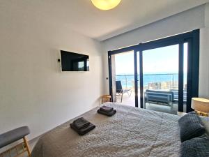 Postel nebo postele na pokoji v ubytování Sunset Waves excellent apartment Benidorm