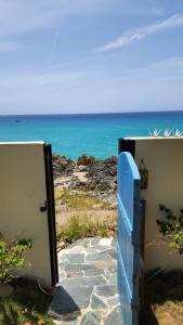 Imagen de la galería de Crimson beach ocean front entire floor villa, en Sosúa