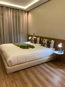 Giường trong phòng chung tại M'ocean Sea View Apartment by 7AV Hotels +17 ảnh