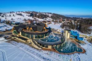 an aerial view of a ski resort in the snow at Ubytovanie Erika in Vitanová