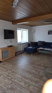 TV a/nebo společenská místnost v ubytování Ferienwohnung