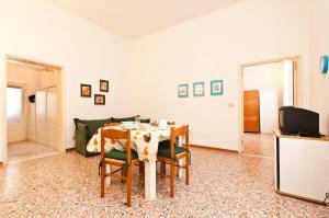 Khu vực ghế ngồi tại Ca' Querini - Apartment