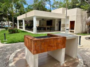 Κήπος έξω από το Casa MEXH Selva II- Vacaciones de ensueño cerca de playas-arrecifes-cenotes y naturaleza