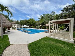 Πισίνα στο ή κοντά στο Casa MEXH Selva II- Vacaciones de ensueño cerca de playas-arrecifes-cenotes y naturaleza