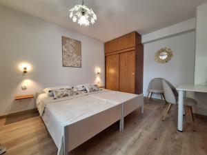 Posteľ alebo postele v izbe v ubytovaní Apartment Ivy
