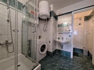 Kúpeľňa v ubytovaní Apartment Ivy + 37 fotografií