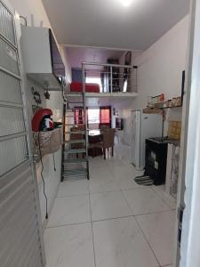 a room with a hallway with a bunk bed at Ap COP 30 NA AUGUSTO MONTENEGRO in Belém