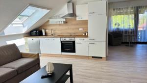 Kuchyň nebo kuchyňský kout v ubytování Haus Schanzenblick Fewo11 im Herzen des Schwarzwaldes