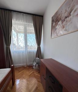 Postel nebo postele na pokoji v ubytování Cozy one-bedroom apartment in the city center