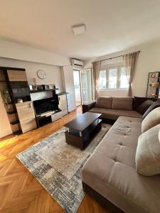 Posezení v ubytování Cozy one-bedroom apartment in the city center + 6 fotografií