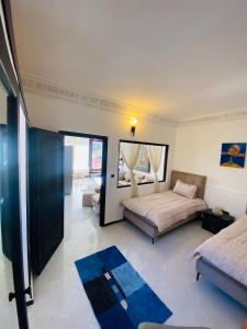 Postel nebo postele na pokoji v ubytování Villas Appart Hotel