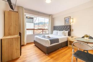 Postel nebo postele na pokoji v ubytování Cusco Hostal Qolla Wasi-II