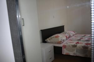 Postel nebo postele na pokoji v ubytování Apartments Šuker