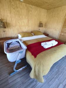 Postel nebo postele na pokoji v ubytování Casa Rayen