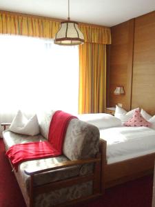 Postel nebo postele na pokoji v ubytování Hotel Menthof