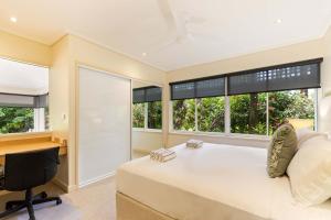 Ένα ή περισσότερα κρεβάτια σε δωμάτιο στο Mirage Resort Villa 444 with access to Sheraton Facilities