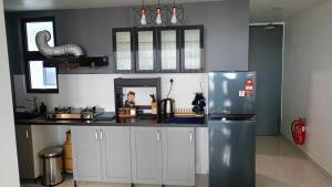Kuchyň nebo kuchyňský kout v ubytování Dynamic Home