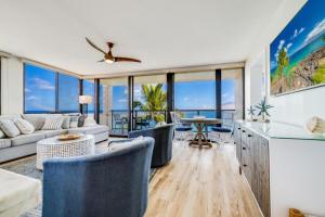 a living room with a couch and a table at KIHEI SURFSIDE, #501 condo in Wailea