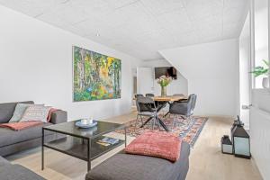 Posezení v ubytování Stokkegaardens Hotel Apartments