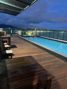 Bazén v ubytování Apto Vista Frontal Mar de Camburi nebo v jeho okolí