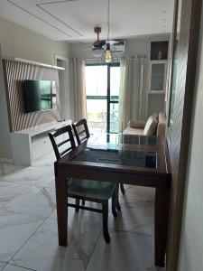 TV a/nebo společenská místnost v ubytování Apto Vista Frontal Mar de Camburi