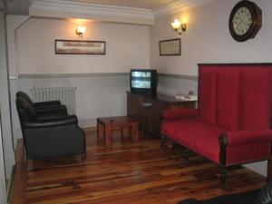 TV a/nebo společenská místnost v ubytování Hostal Canovas
