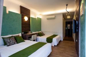 Postel nebo postele na pokoji v ubytování 墾丁合歡8宿-Ho Huan B & B