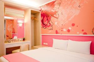 Postel nebo postele na pokoji v ubytování 墾丁合歡8宿-Ho Huan B & B