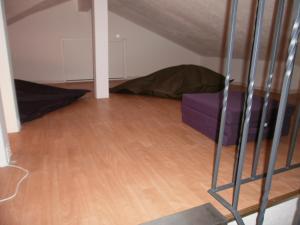 Postel nebo postele na pokoji v ubytování Apartmenthaus Offenbach