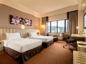 Postel nebo postele na pokoji v ubytování Sunway Hotel Georgetown Penang