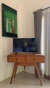 TV o dispositivi per l'intrattenimento presso Mayong Bali Villa and Hostel